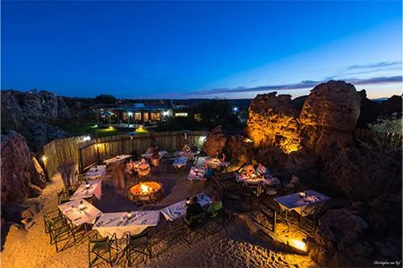 The Kagga Kamma Boma glowing around a fire after sunset