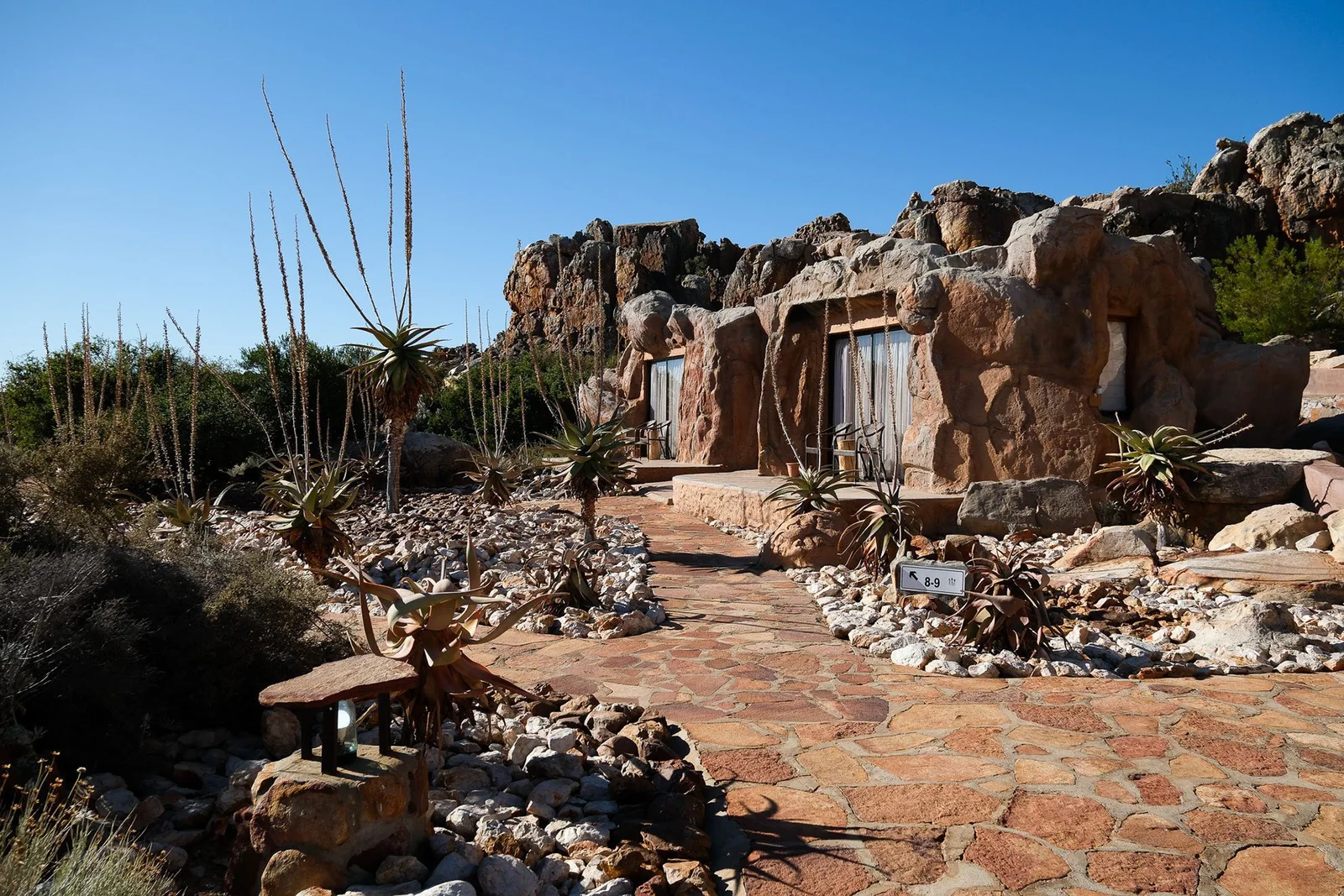 Kagga Kamma Cave Suites merging into sunlit Cederberg sandstone
